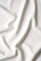 Closeup af stoffet på re do® Active T-shirt i Star White. #star white
